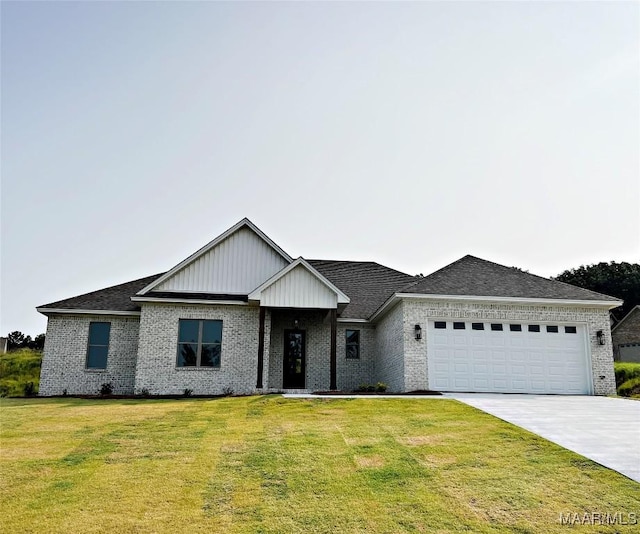 171 Mountain Laurel Rdg, Wetumpka, AL 36093 - view of front facade with brick siding, an attached garage, a front yard, and concrete driveway