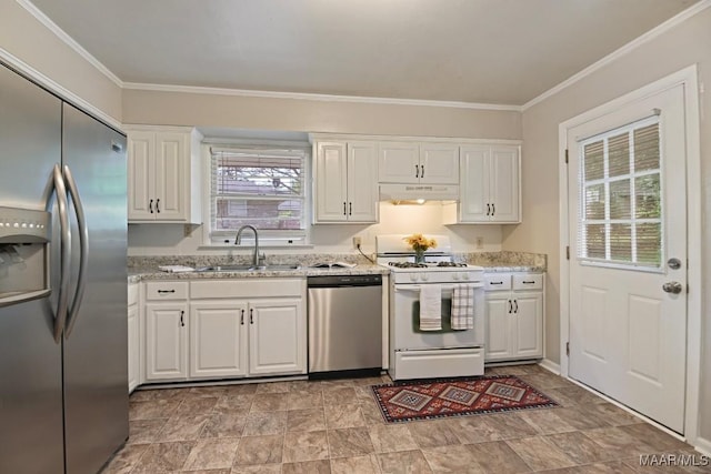kitchen featuring white cabinets, crown molding, appliances with stainless steel finishes, a sink, and under cabinet range hood