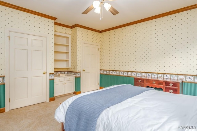 bedroom with crown molding, a ceiling fan, wallpapered walls, and light carpet