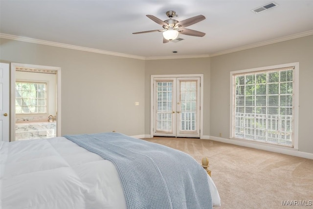 bedroom with visible vents, ornamental molding, baseboards, and french doors