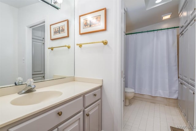 full bathroom with vanity, tile patterned floors, toilet, and shower / bathtub combination with curtain