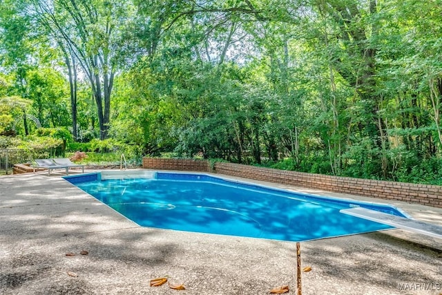 pool featuring a patio