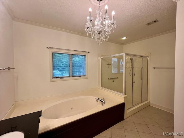 bathroom featuring tile patterned floors, ornamental molding, a textured ceiling, and visible vents