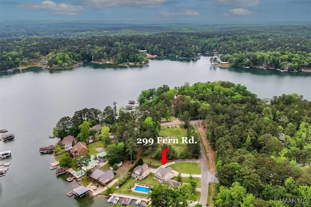 aerial view with a view of trees and a water view