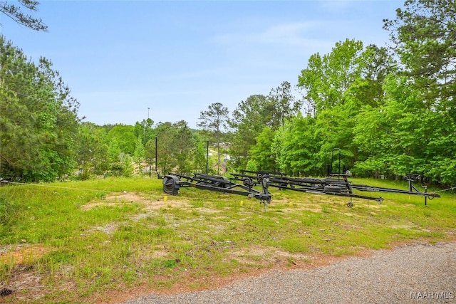 view of property's community with a forest view