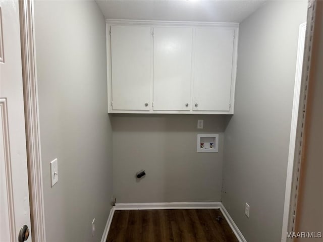 laundry room featuring cabinet space, washer hookup, baseboards, hookup for an electric dryer, and dark wood-style floors