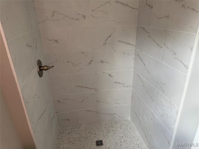 bathroom featuring a stall shower
