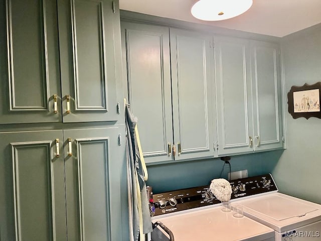 laundry area with cabinet space and washer and dryer