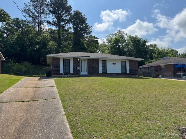 3008 Baffin Dr, Montgomery, AL 36110 - ranch-style home featuring fence, driveway, brick siding, and a front yard