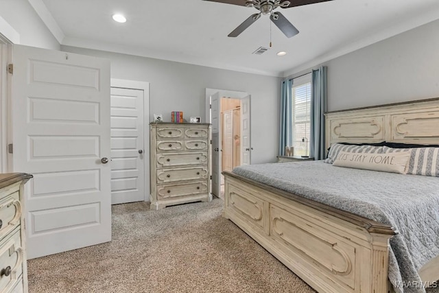 bedroom with carpet, a ceiling fan, recessed lighting, and visible vents