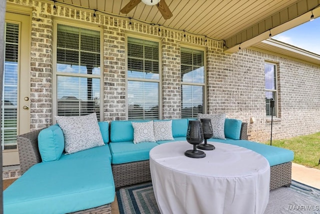 view of patio / terrace featuring an outdoor living space and a ceiling fan