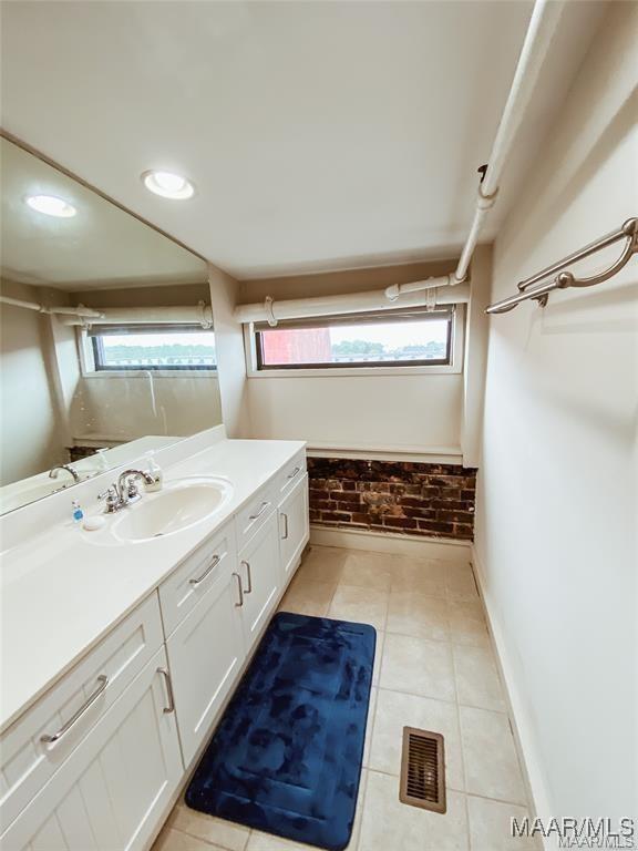 246 N Court St Unit J, Montgomery, AL 36104 - full bath with visible vents, tile patterned flooring, a shower, vanity, and recessed lighting