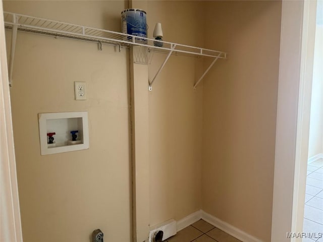 6253 S Hampton Dr, Montgomery, AL 36116 - laundry room with washer hookup, laundry area, baseboards, and light tile patterned floors
