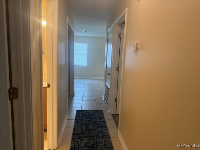 6253 S Hampton Dr, Montgomery, AL 36116 - hallway featuring baseboards and light tile patterned floors