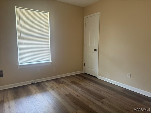 6253 S Hampton Dr, Montgomery, AL 36116 - empty room with baseboards and dark wood finished floors