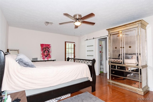 206 Choctaw Dr, Montgomery, AL 36117 - bedroom with wood finished floors and ceiling fan