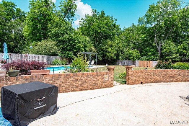 206 Choctaw Dr, Montgomery, AL 36117 - view of patio featuring a fenced backyard and view of scattered trees