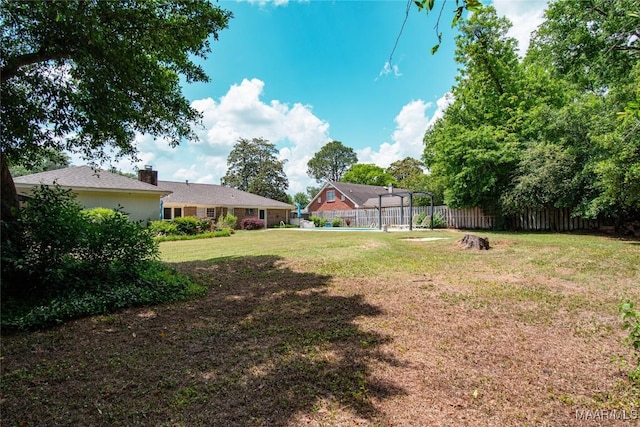 view of yard featuring fence