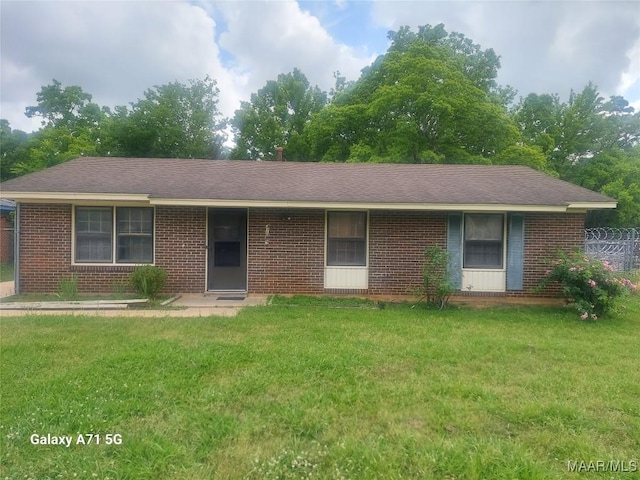4709 S Court St, Montgomery, AL 36105 - ranch-style house featuring fence, brick siding, and a front yard