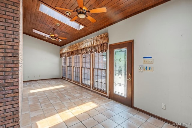 1520 Meriwether Rd, Montgomery, AL 36117 - spare room featuring lofted ceiling, ceiling fan, wood ceiling, a skylight, and light tile patterned floors