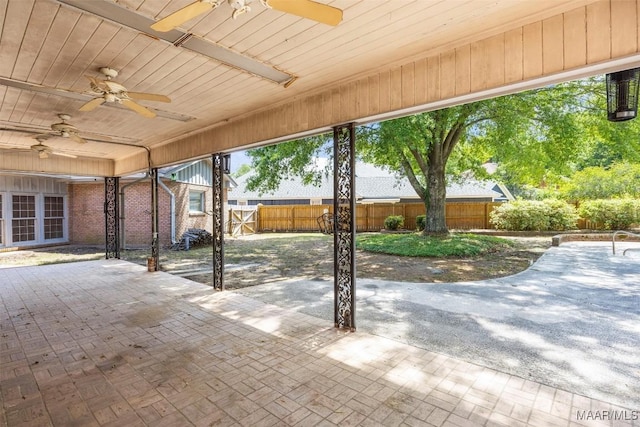 1520 Meriwether Rd, Montgomery, AL 36117 - fenced backyard featuring ceiling fan, a patio, and a gate