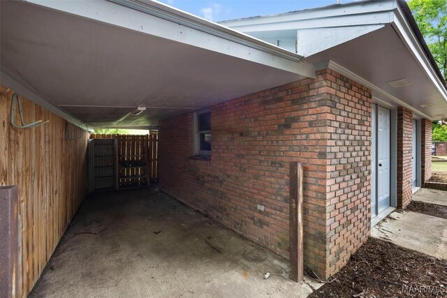 1520 Meriwether Rd, Montgomery, AL 36117 - view of property exterior with brick siding and an attached carport