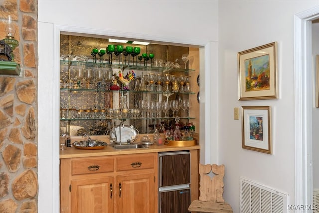 3146 Malone Dr, Montgomery, AL 36106 - bar with visible vents, a sink, and indoor wet bar