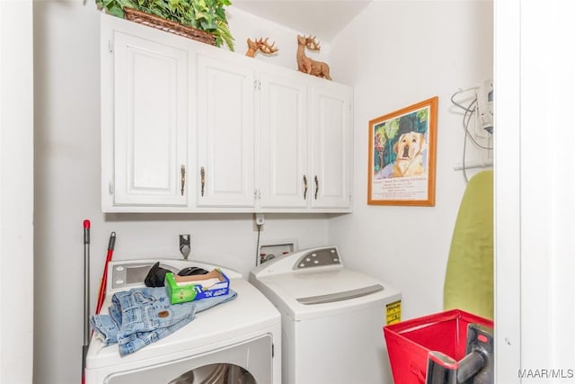 3146 Malone Dr, Montgomery, AL 36106 - laundry room featuring cabinet space and washing machine and dryer