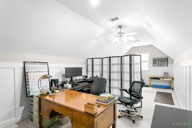 home office with carpet flooring, a ceiling fan, visible vents, and lofted ceiling