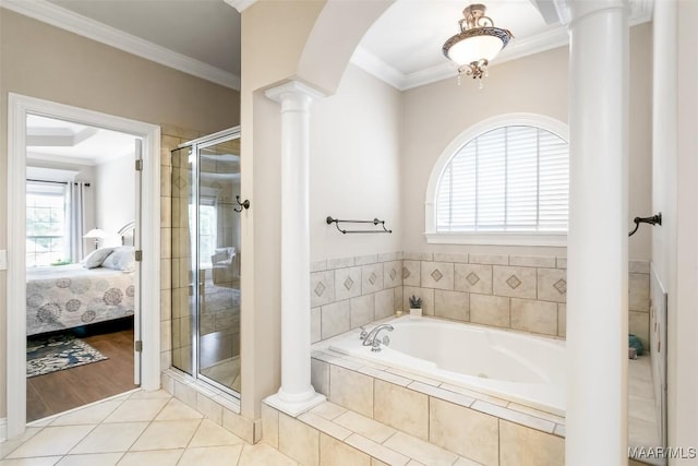 full bathroom with crown molding, a shower stall, ornate columns, and ensuite bath
