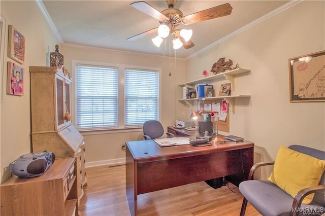 908 W Tuskeena St, Wetumpka, AL 36092 - home office with crown molding, ceiling fan, baseboards, and light wood-style flooring