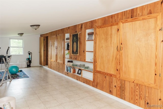 2755 Cherokee Trl, Tallassee, AL 36078 - exercise area featuring baseboards, crown molding, tile patterned floors, and wooden walls