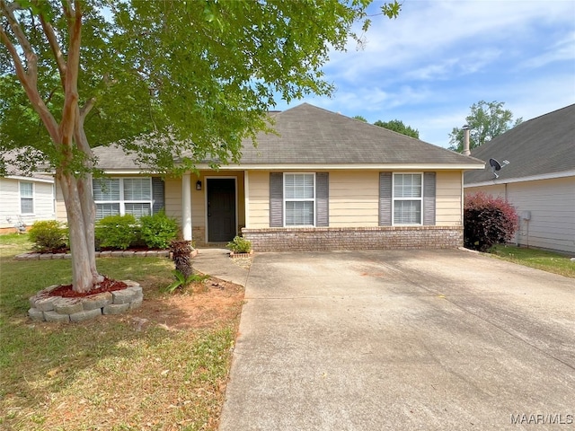 1672 Hawthorne Ln, Prattville, AL 36066 - view of front of home featuring brick siding, driveway, and a shingled roof