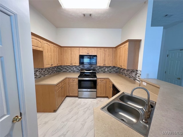 1672 Hawthorne Ln, Prattville, AL 36066 - kitchen with electric range, visible vents, black microwave, a sink, and marble finish floor