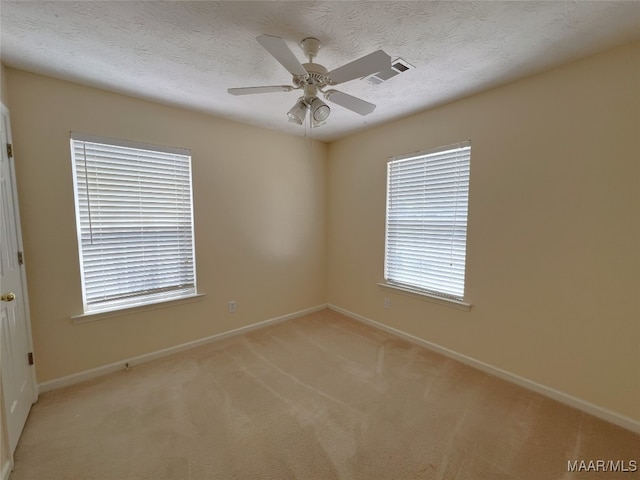 1672 Hawthorne Ln, Prattville, AL 36066 - empty room featuring baseboards, visible vents, light carpet, and ceiling fan