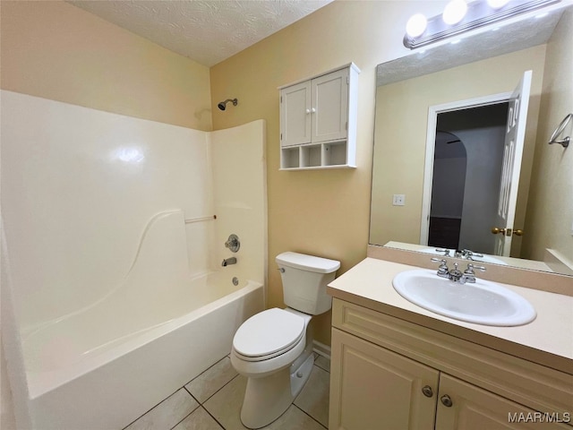 1672 Hawthorne Ln, Prattville, AL 36066 - full bath with tile patterned flooring, vanity, toilet, a textured ceiling, and shower / bathing tub combination