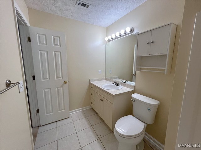 1672 Hawthorne Ln, Prattville, AL 36066 - bathroom with a textured ceiling, visible vents, tile patterned floors, vanity, and toilet