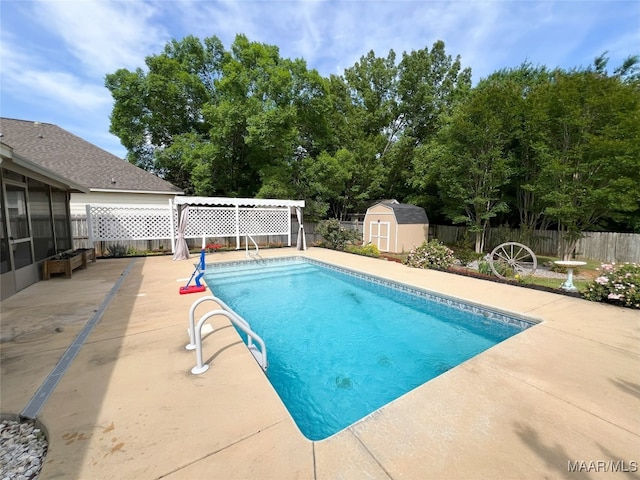 1672 Hawthorne Ln, Prattville, AL 36066 - view of swimming pool featuring an outdoor structure, a pergola, a fenced backyard, a storage unit, and a patio area