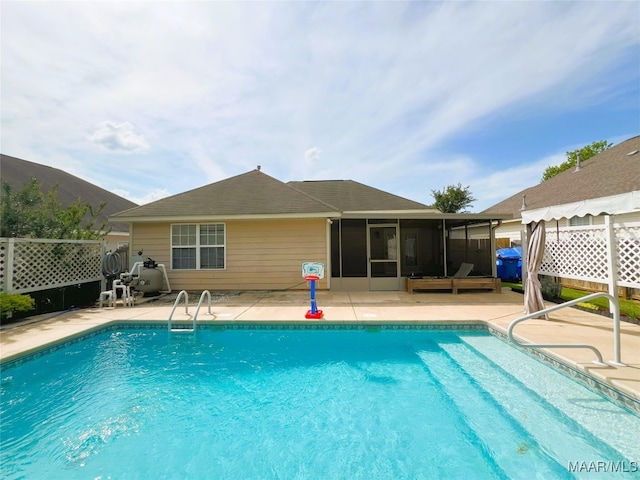 1672 Hawthorne Ln, Prattville, AL 36066 - view of swimming pool featuring a patio, a fenced in pool, fence, and a sunroom