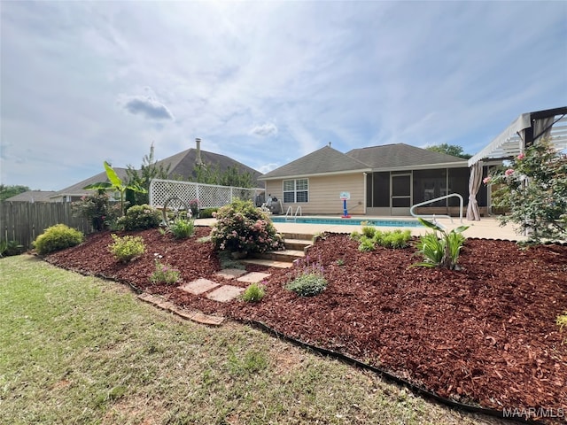 1672 Hawthorne Ln, Prattville, AL 36066 - view of yard with a sunroom, a patio, fence private yard, and a fenced in pool