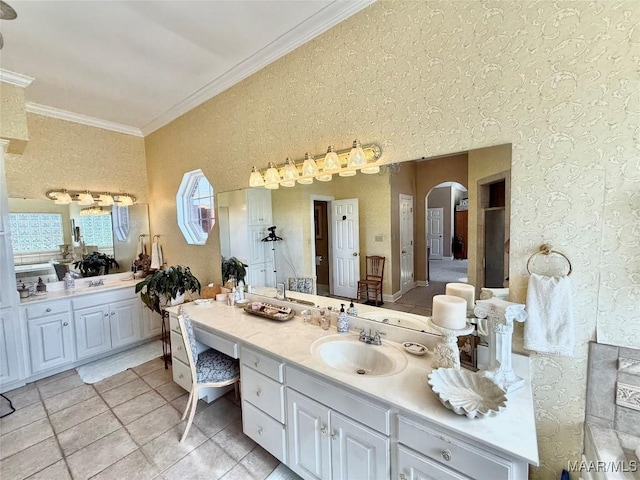 full bathroom with vanity, ornamental molding, and tile patterned floors