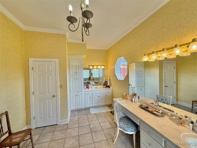 bathroom featuring crown molding, vanity, tile patterned floors, and a chandelier