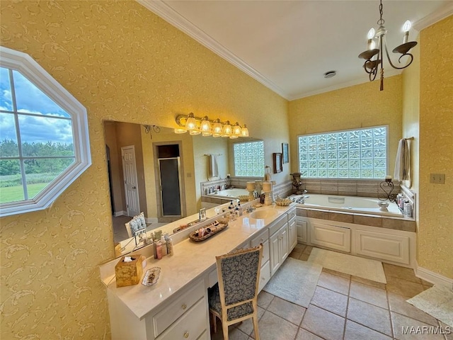 full bathroom with a notable chandelier, a bath, a healthy amount of sunlight, and a shower stall