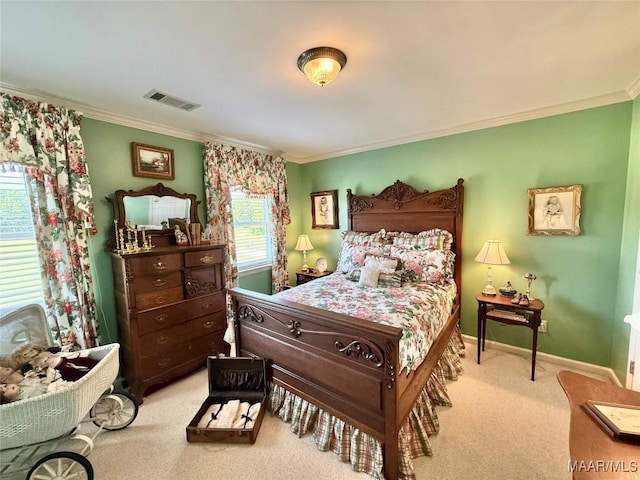 bedroom with crown molding, baseboards, carpet, and visible vents
