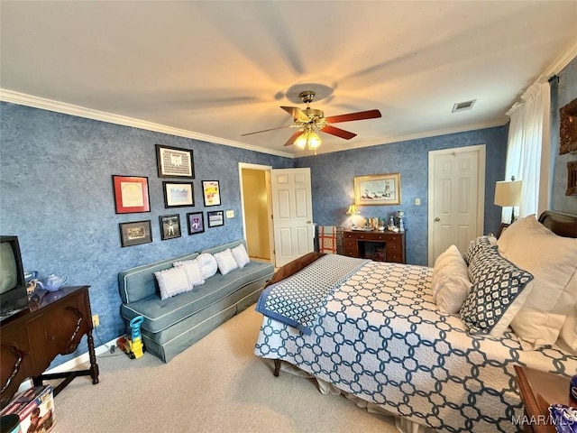 carpeted bedroom featuring ornamental molding, ceiling fan, and visible vents