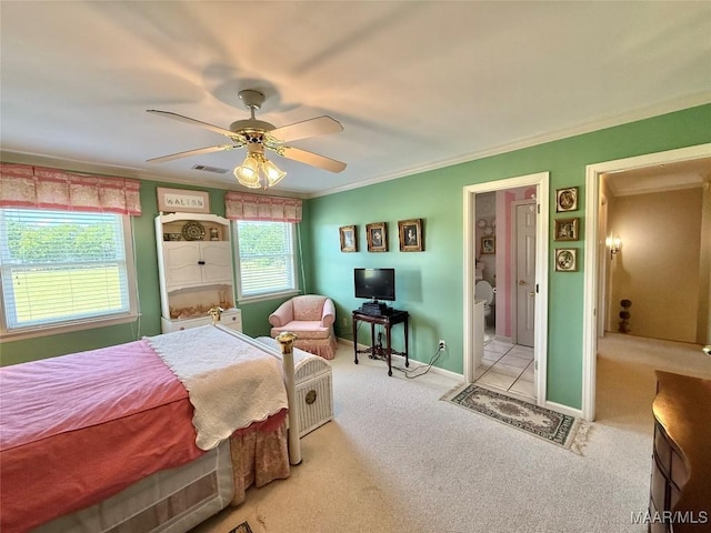 bedroom with visible vents, ornamental molding, carpet, and ceiling fan