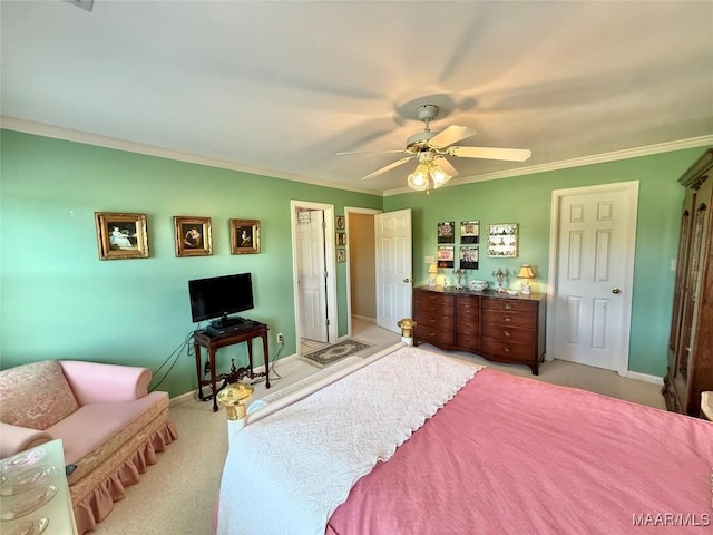 bedroom featuring baseboards, ornamental molding, ceiling fan, and light colored carpet