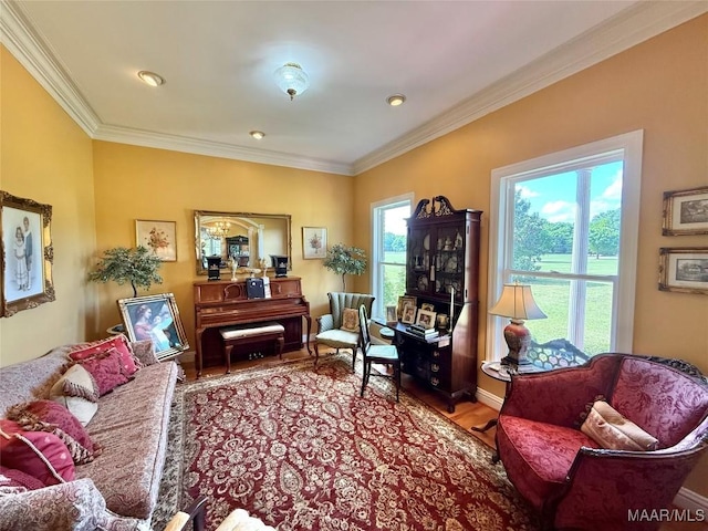 living area with recessed lighting, ornamental molding, and wood finished floors