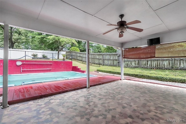 view of patio featuring a ceiling fan and a fenced backyard