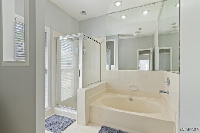 8800 Oak Meadow Ct, Montgomery, AL 36116 - full bathroom featuring a garden tub, tile patterned floors, a stall shower, and recessed lighting